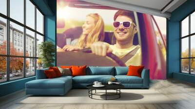 happy friends driving in cabriolet car Wall mural