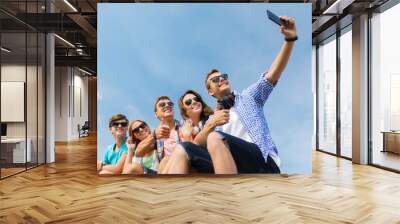 happy friends with smartphone taking selfie Wall mural