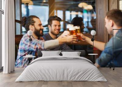 happy male friends drinking beer at bar or pub Wall mural