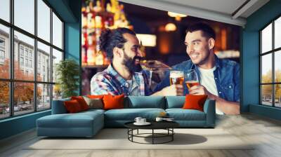 happy male friends drinking beer at bar or pub Wall mural