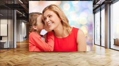 happy mother and girl whispering into ear Wall mural