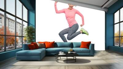 happy smiling sporty young woman jumping in air Wall mural