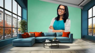 happy smiling young indian woman in glasses Wall mural