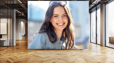 happy smiling young woman on summer city street Wall mural