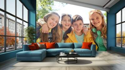 happy teenage students or friends outdoors Wall mural