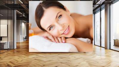 happy woman in spa salon Wall mural