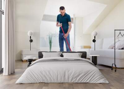 household, housework and people concept - happy man with mop and bucket cleaning floor at home Wall mural