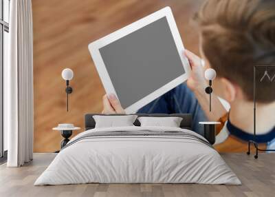 leisure, technology and people concept - close up of boy with tablet pc computer at home Wall mural