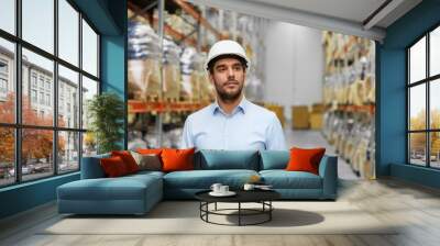 logistic business, shipment and people concept - businessman in helmet at warehouse Wall mural