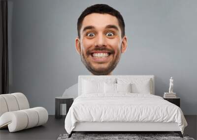 man with funny face over gray background Wall mural