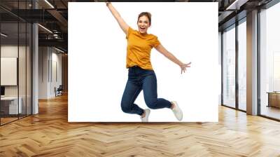 motion, freedom and people concept - happy young woman or teenage girl jumping over white background Wall mural