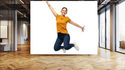 motion, freedom and people concept - happy young woman or teenage girl jumping over white background Wall mural