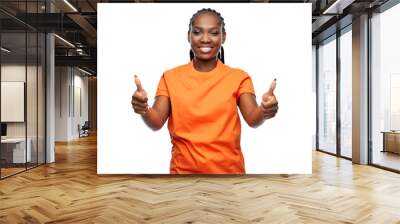 people, gesture and portrait concept - happy young woman showing thumbs up over white background Wall mural