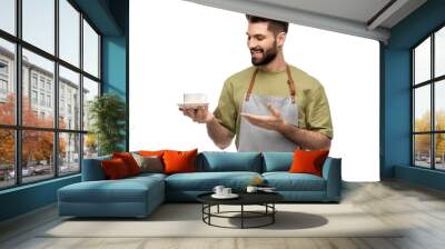 people, profession and job concept - happy smiling waiter or barista in apron holding cup of coffee over white background Wall mural