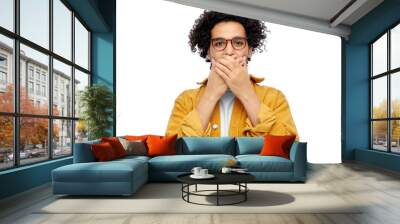 people and emotion concept - man in glasses and yellow jacket covering mouth by hands over white background Wall mural