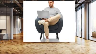 people and furniture concept - man with laptop computer sitting in chair over white background Wall mural