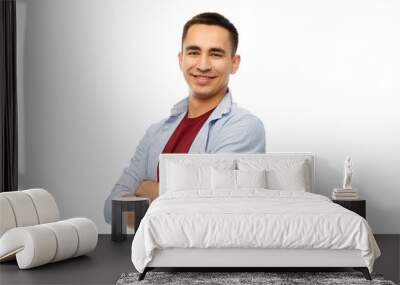 people concept - smiling young man over white background Wall mural