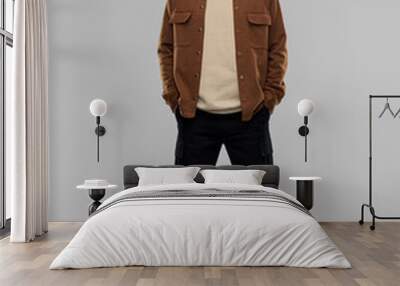 people concept - young man in brown jacket and black pants with mustaches over grey background Wall mural