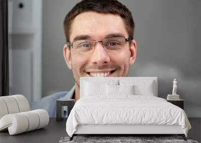 portrait of businessman in eyeglasses at office Wall mural