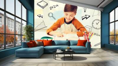 smiling, student boy reading book at home Wall mural