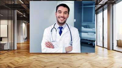 smiling doctor with stethoscope at hospital  Wall mural