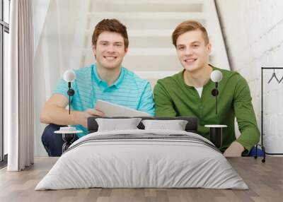 smiling male students with tablet pc computer Wall mural