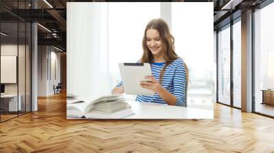 smiling student girl with tablet pc and books Wall mural