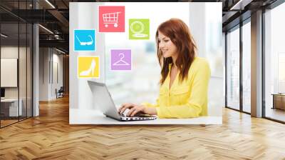 smiling woman with laptop shopping online at home Wall mural