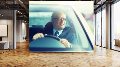 transport, business trip and people concept - happy senior businessman driving car Wall mural