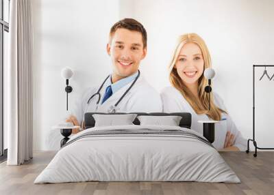 two young attractive doctors Wall mural