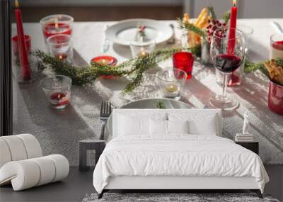 winter holidays, dinner party and celebration concept - close up of christmas table serving at home Wall mural