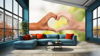 woman and man hands showing heart shape Wall mural