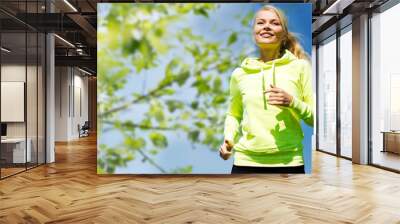 woman jogging outdoors Wall mural