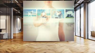 woman pressing button on virtual screen Wall mural