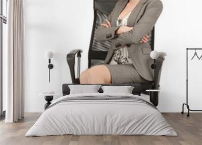 young businesswoman sitting in chair Wall mural