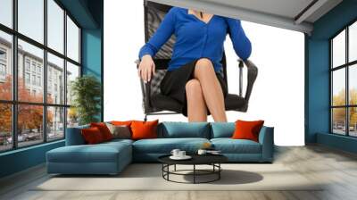 young businesswoman sitting in chair Wall mural