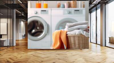 Concept Washing colorful clothes in the laundry room or at home. Washing machine and basket with dirty or clean colored clothes Wall mural