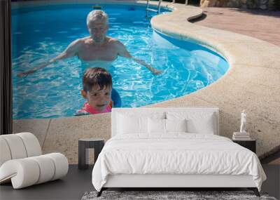 Grandfather and Grandson Enjoy Swimming Together Wall mural