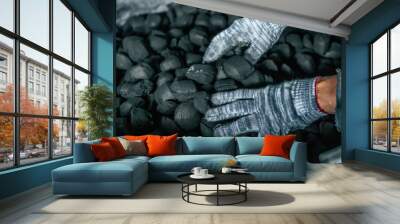 Coal mining - Man's hands in gloves holding natural black coal for back. Picture idea about coal mining, coal processing, energy source, environmental protection. Industrial coals.  Wall mural