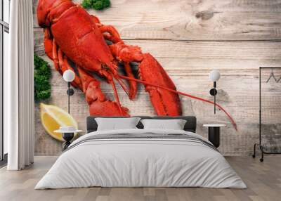 Steamed lobster with lemon on wooden  background Wall mural