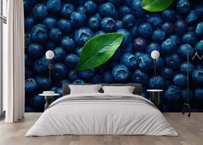 Fresh Blueberries with Green Leaves Close-Up. Heart-Healty concept, Heart-Check Certified Fruits. Wall mural