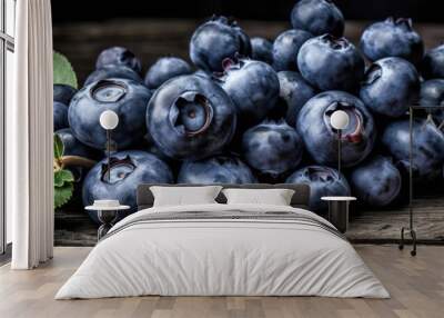 Blueberries on Rustic Wooden Table. Fresh Juicy Delicious and Ripe Garden Berries for Healthy Diet Culinary Delights. Closeup of Natural Blueberries with Copy Space. Eco Farming concept. generative ai Wall mural