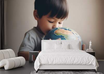 Child holding a globe in hands, hugging Earth planet, Earth Day concept Wall mural