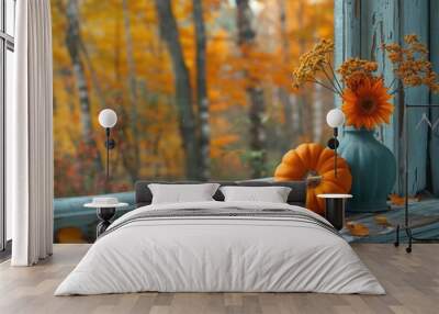 A vase with two orange pumpkins and some leaves sits on a window sill Wall mural