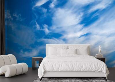 Dramatic blue cloudy sky view - natural blue sky background. Blue sky landscape view Wall mural