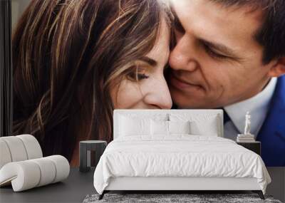 sensual romantic newlywed couple, hugging, face closeup Wall mural