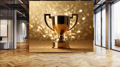 Sparkles gold background with a winners cup. Champion golden trophy on gold background. Concept of success and achievement. Wall mural