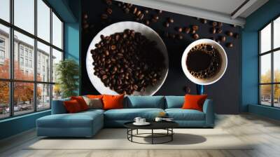 Coffee mug with roasted coffee beans on wooden table. View from top Wall mural