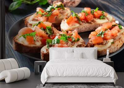 Appetizer bruschetta with tuna, mozarella cheese and tomatoes Wall mural