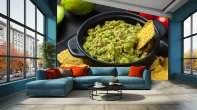 Bowl of guacamole with corn chips Wall mural